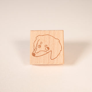 Long-haired Dachshund Guilty Stamp